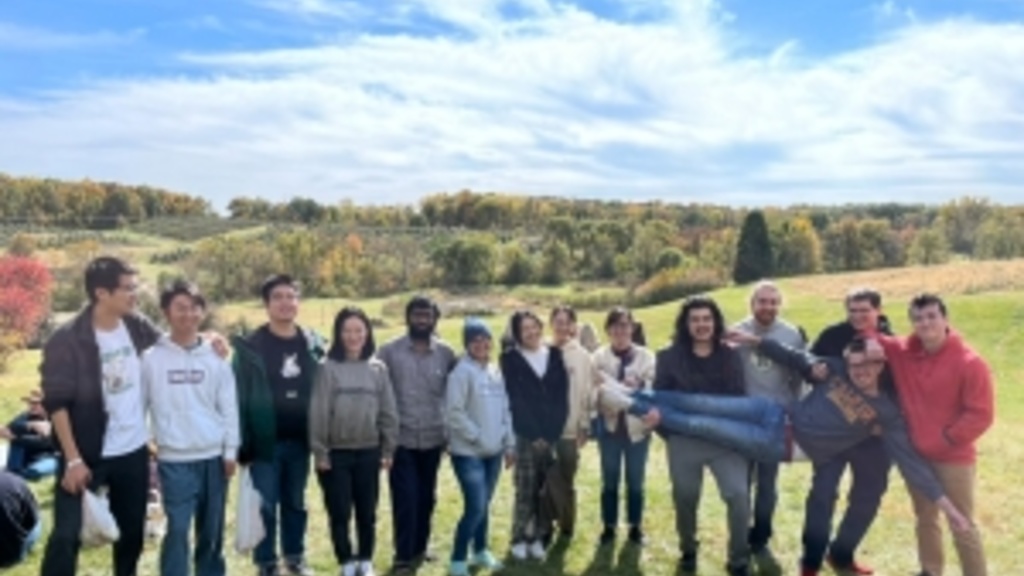 Statistics and Actuarial Science graduate students visit Wilson's apple orchard. 