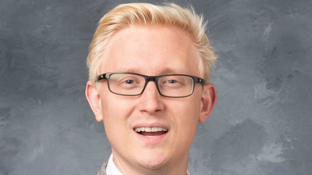A portrait of Andrew M Thomas